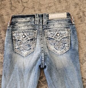 Rock Revival Mid Rise Bootcut Jeans